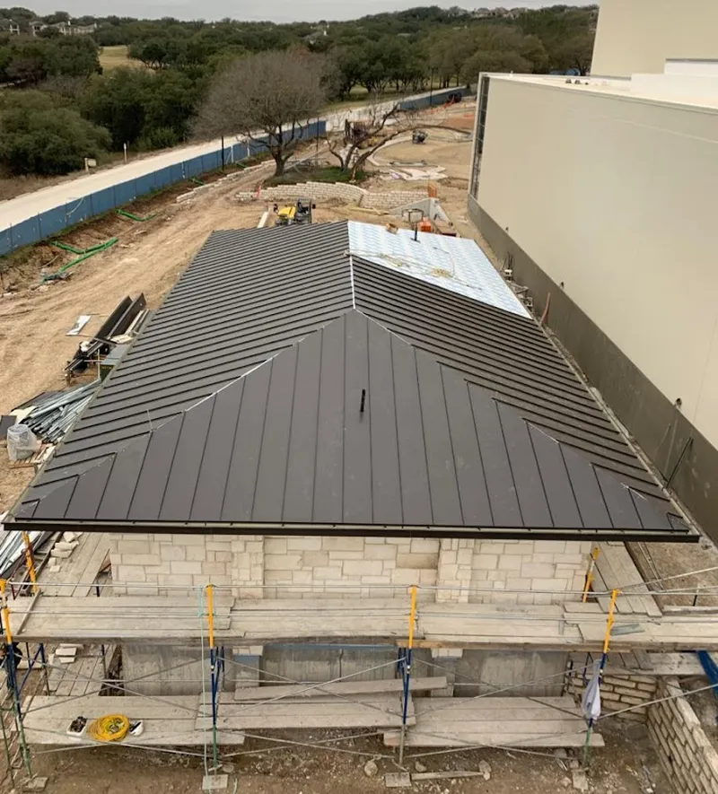 Metal roof new construction with scaffolding in DeRidder